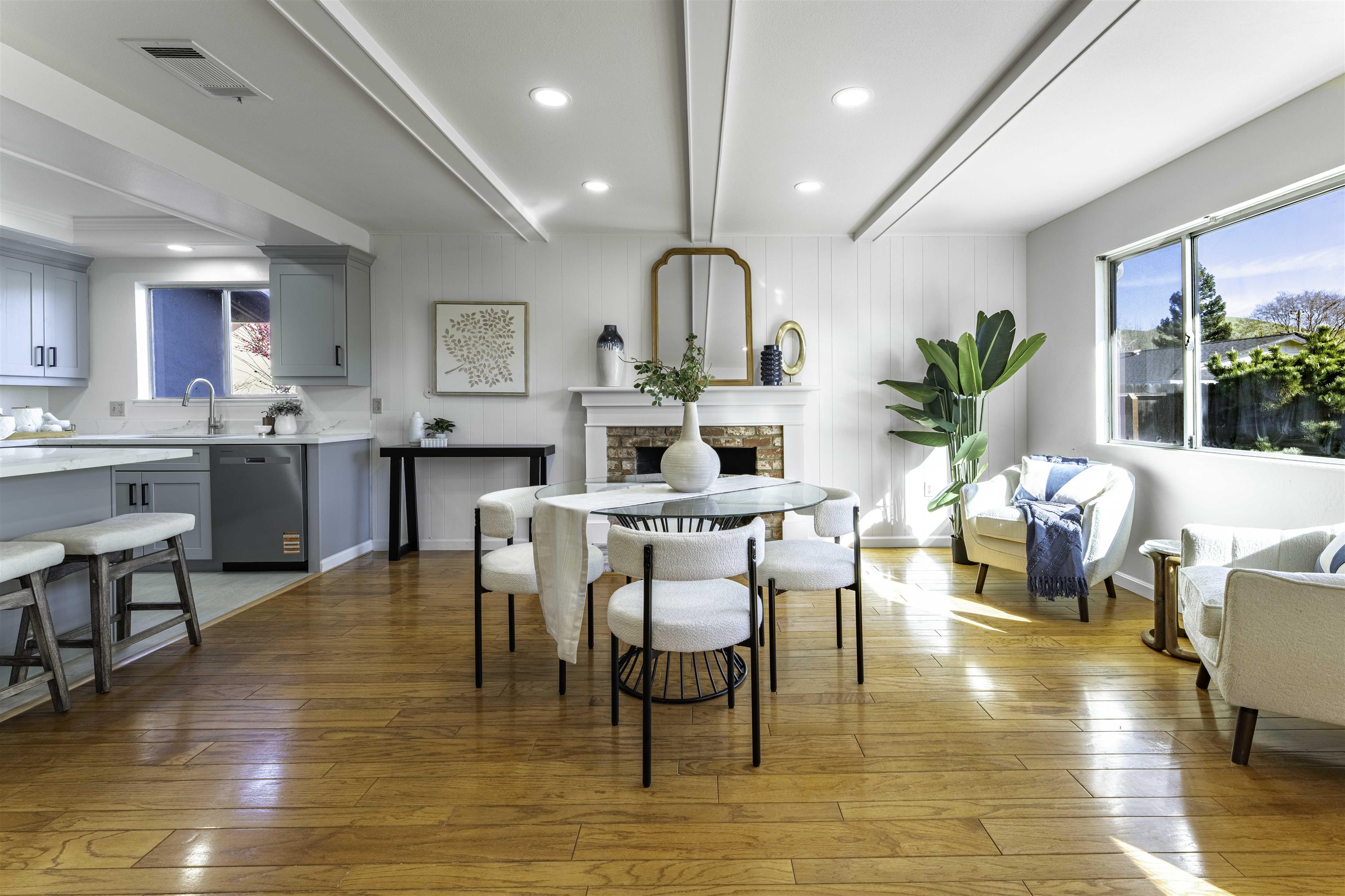 20 Fircrest Court San Ramon, CA 94583 - Photo 9 of 38 a dining room with wooden floor a chandelier a wooden table and chairs