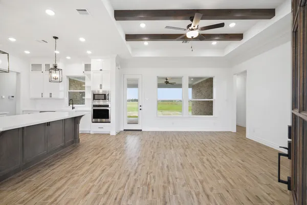 a view of kitchen and windows