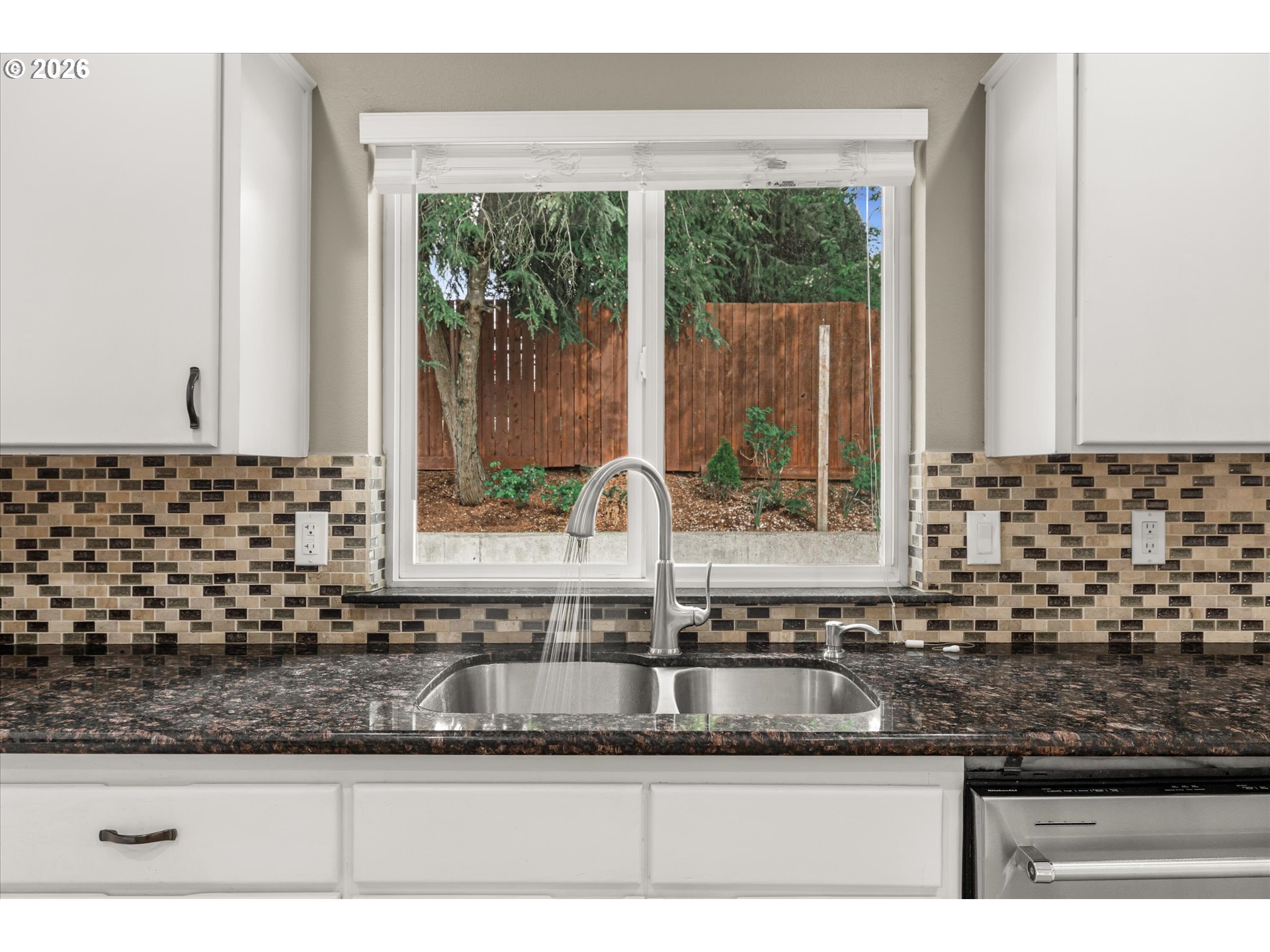 17200 Littlepage Avenue Sandy, OR 97055 - Photo 17 of 47 a bathroom with a granite countertop sink and a window