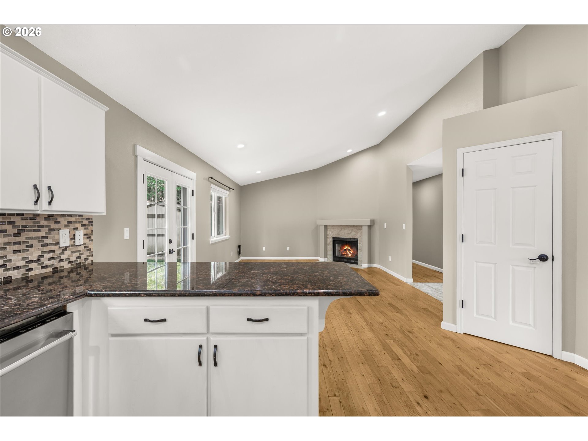 17200 Littlepage Avenue Sandy, OR 97055 - Photo 18 of 47 a kitchen with kitchen island granite countertop a sink and cabinets