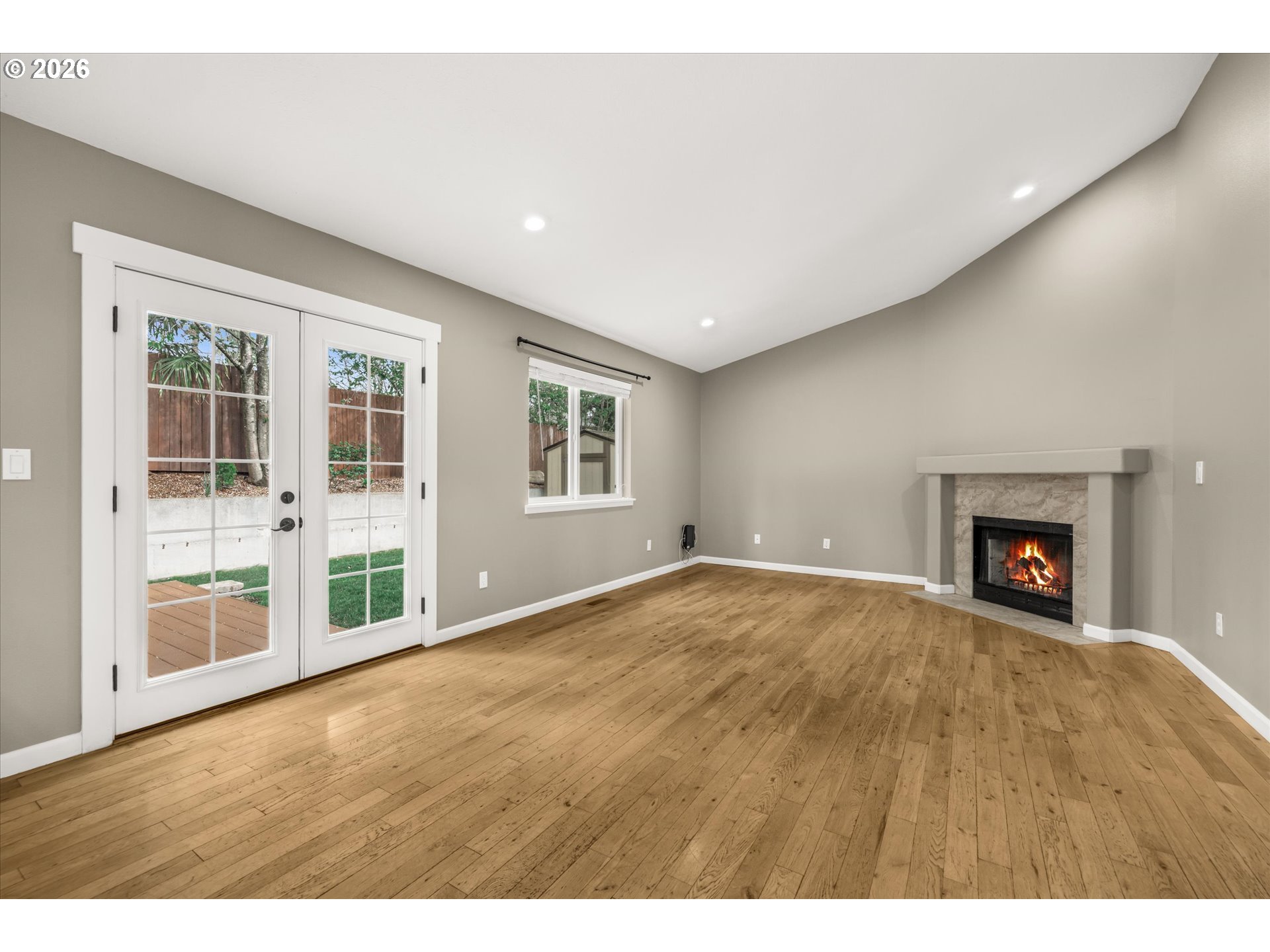 17200 Littlepage Avenue Sandy, OR 97055 - Photo 19 of 47 a view of an empty room with a window and fireplace
