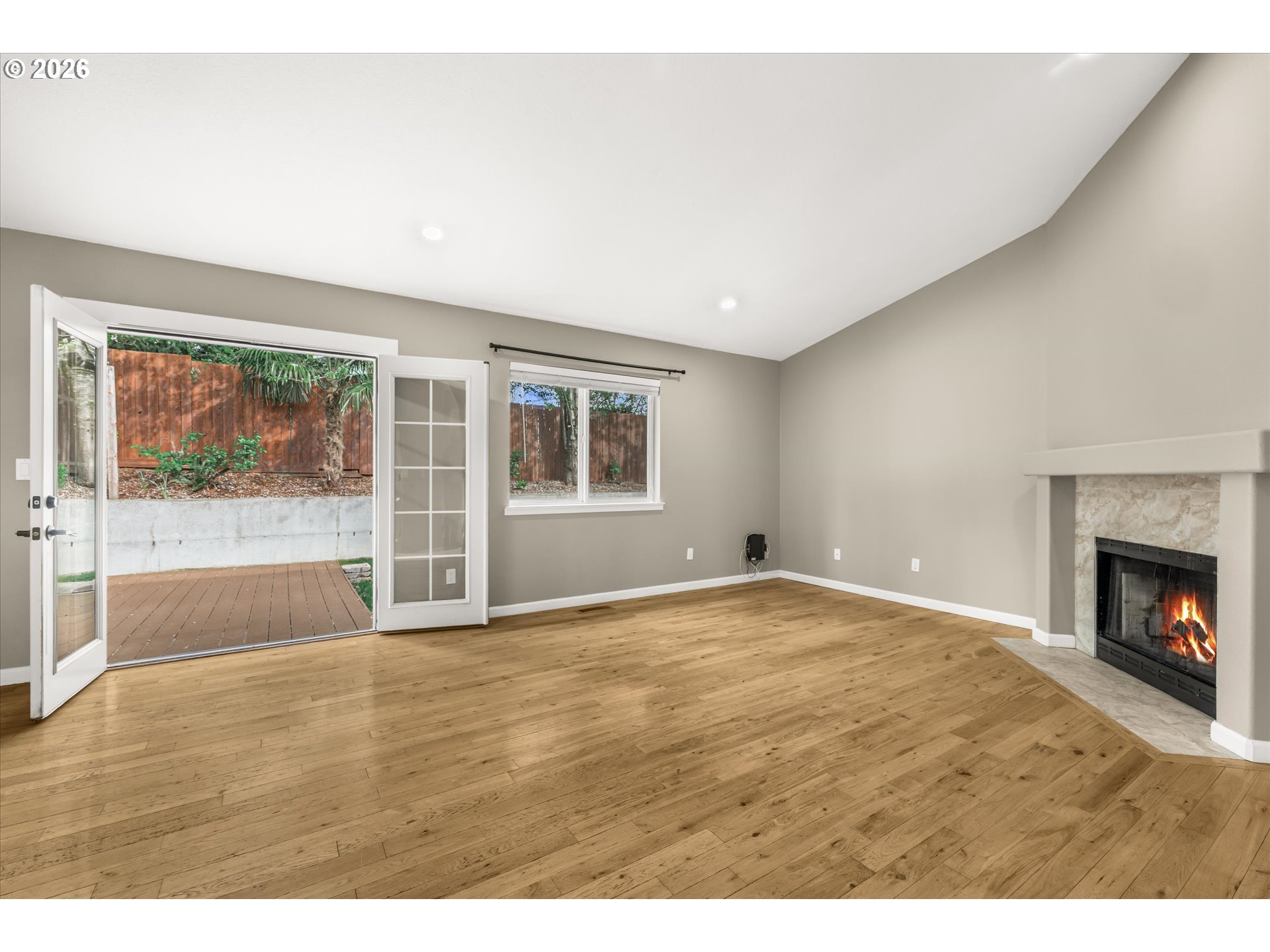 17200 Littlepage Avenue Sandy, OR 97055 - Photo 22 of 47 a view of an empty room with a fireplace and a window