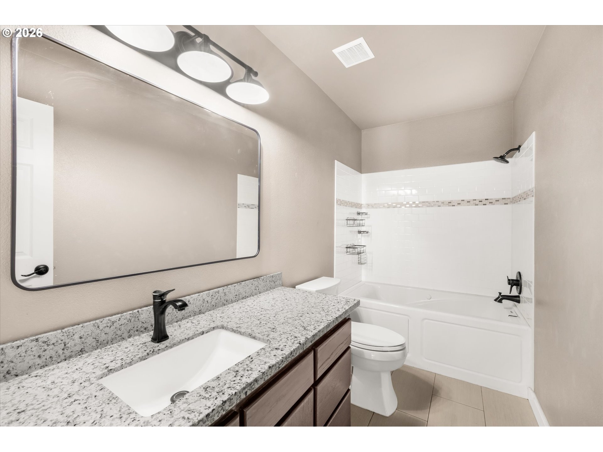 17200 Littlepage Avenue Sandy, OR 97055 - Photo 29 of 47 a bathroom with a granite countertop sink a toilet and a mirror