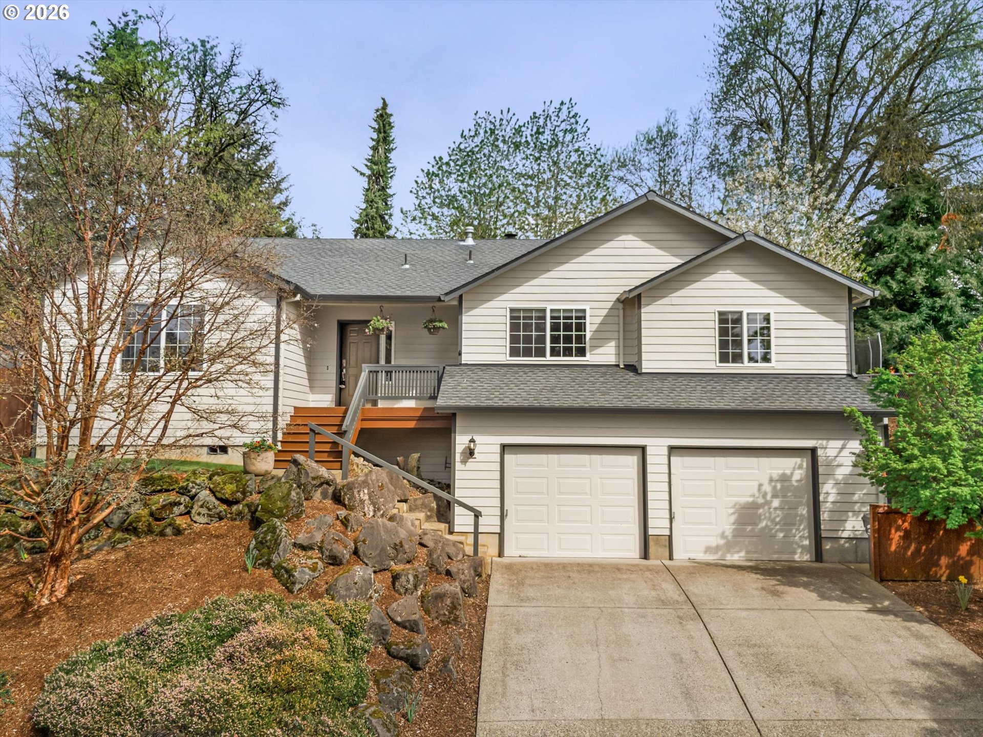 17200 Littlepage Avenue Sandy, OR 97055 - Photo 4 of 47 a front view of a house with a garden