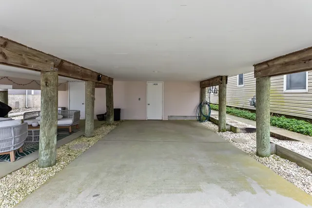 a view of livingroom with furniture and window