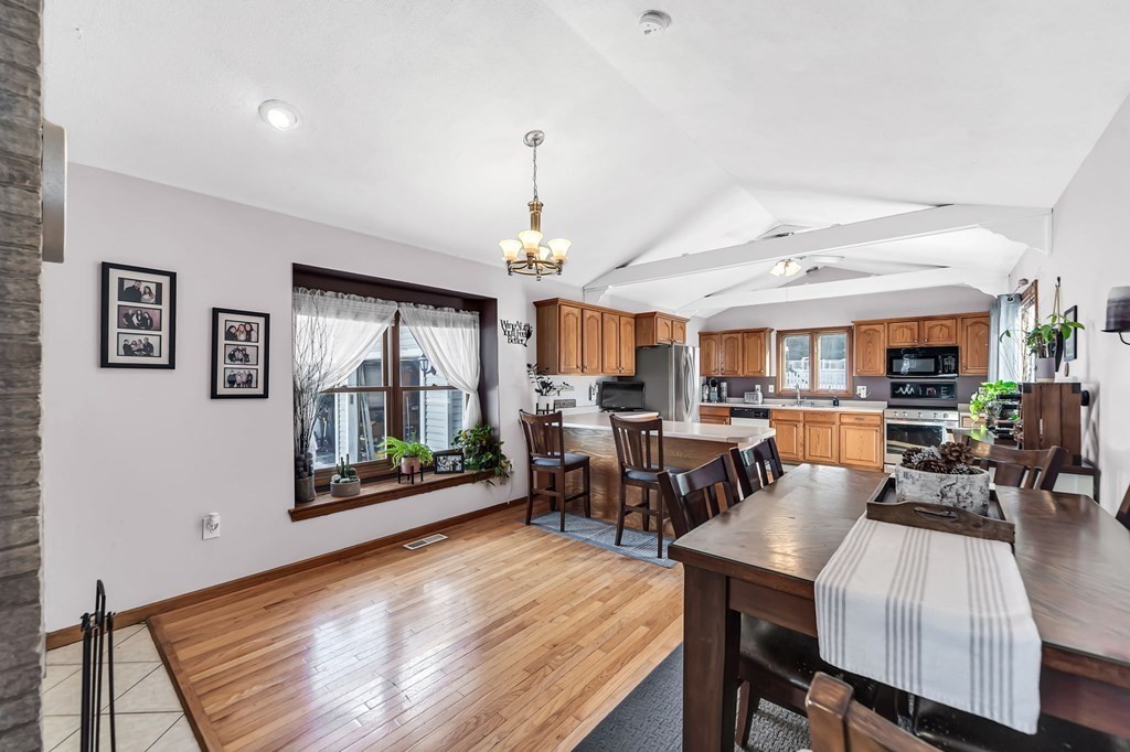5 Pine Knoll Road Southwick, MA 01077 - Photo 12 of 40 a view of a dining room with furniture window and outside view