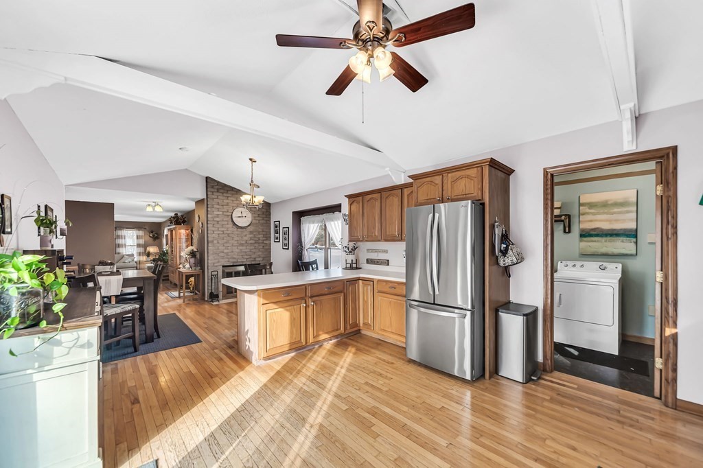 5 Pine Knoll Road Southwick, MA 01077 - Photo 14 of 40 a kitchen with granite countertop a refrigerator oven a sink dishwasher and a refrigerator