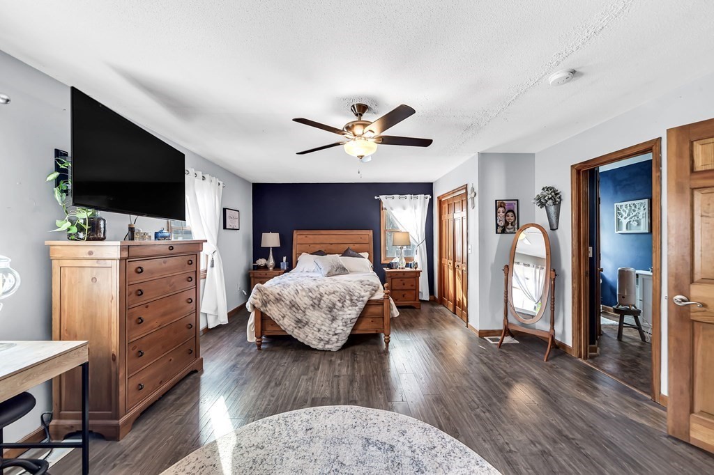 5 Pine Knoll Road Southwick, MA 01077 - Photo 16 of 40 a bedroom with furniture and flat screen tv