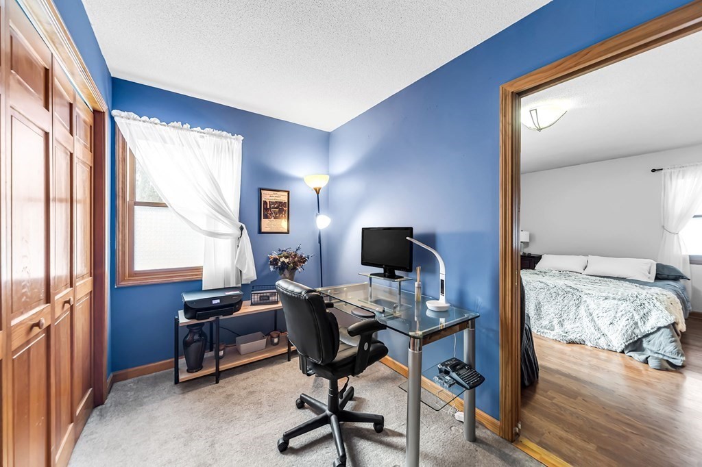 5 Pine Knoll Road Southwick, MA 01077 - Photo 20 of 40 a view of a workspace with furniture and a window