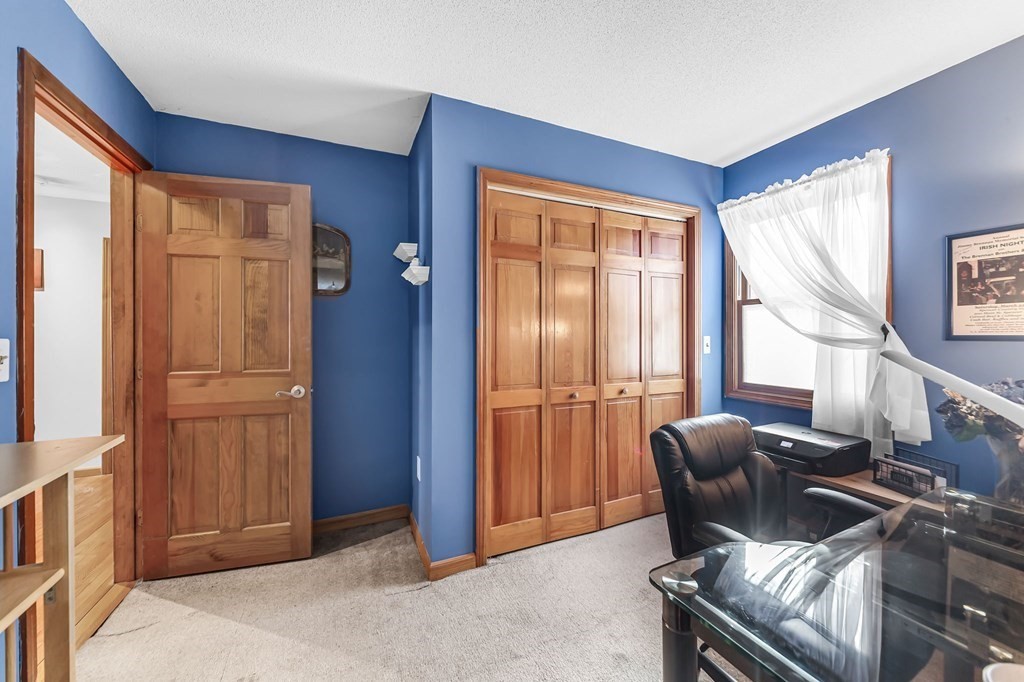 5 Pine Knoll Road Southwick, MA 01077 - Photo 21 of 40 a view of a livingroom with furniture and window