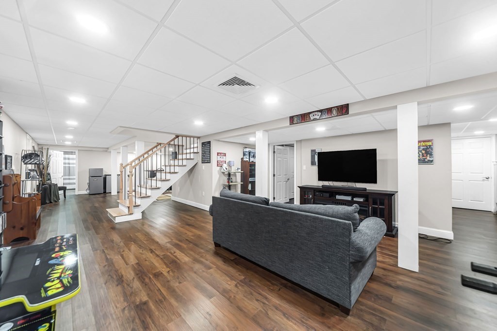 5 Pine Knoll Road Southwick, MA 01077 - Photo 26 of 40 a living room with furniture and a flat screen tv