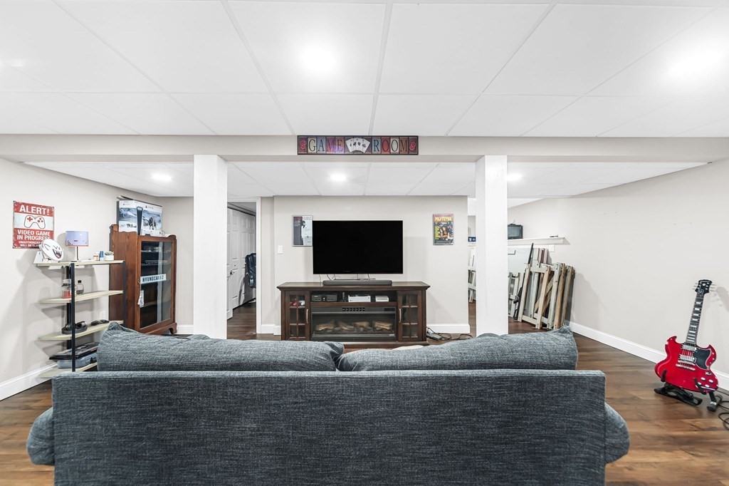 5 Pine Knoll Road Southwick, MA 01077 - Photo 28 of 40 a living room with furniture and a flat screen tv