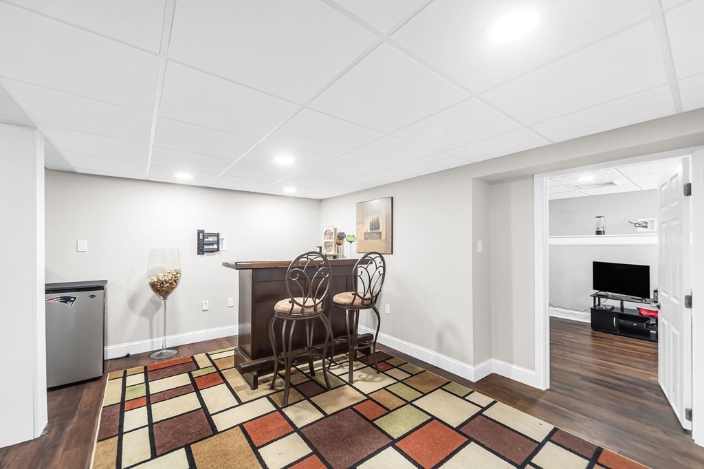 5 Pine Knoll Road Southwick, MA 01077 - Photo 32 of 40 a view of a livingroom with furniture and a fireplace