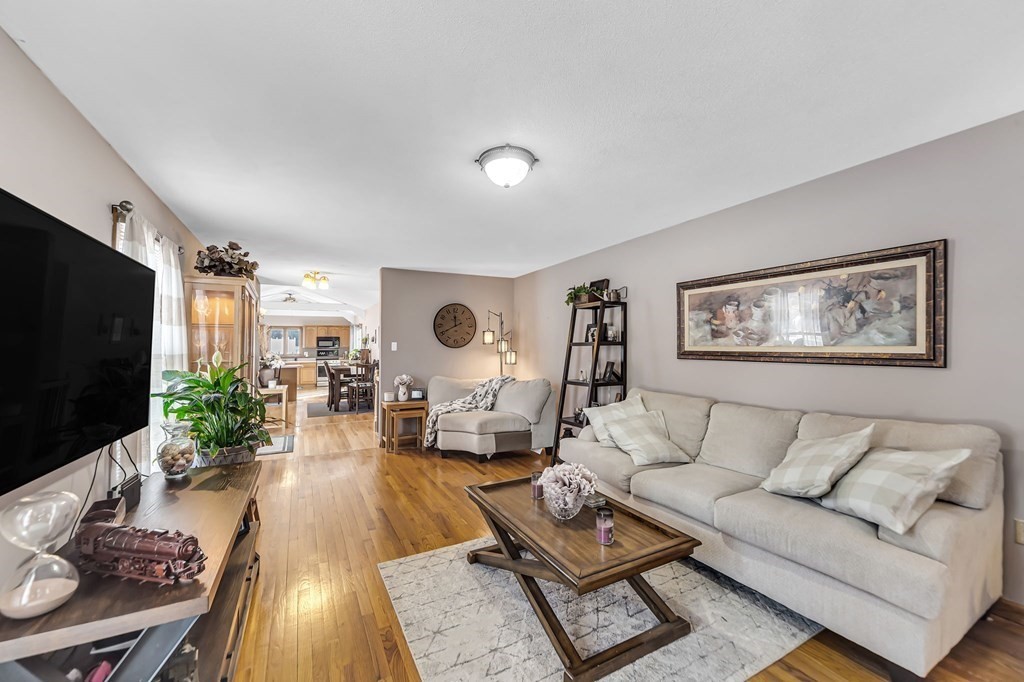 5 Pine Knoll Road Southwick, MA 01077 - Photo 4 of 40 a living room with furniture and a flat screen tv