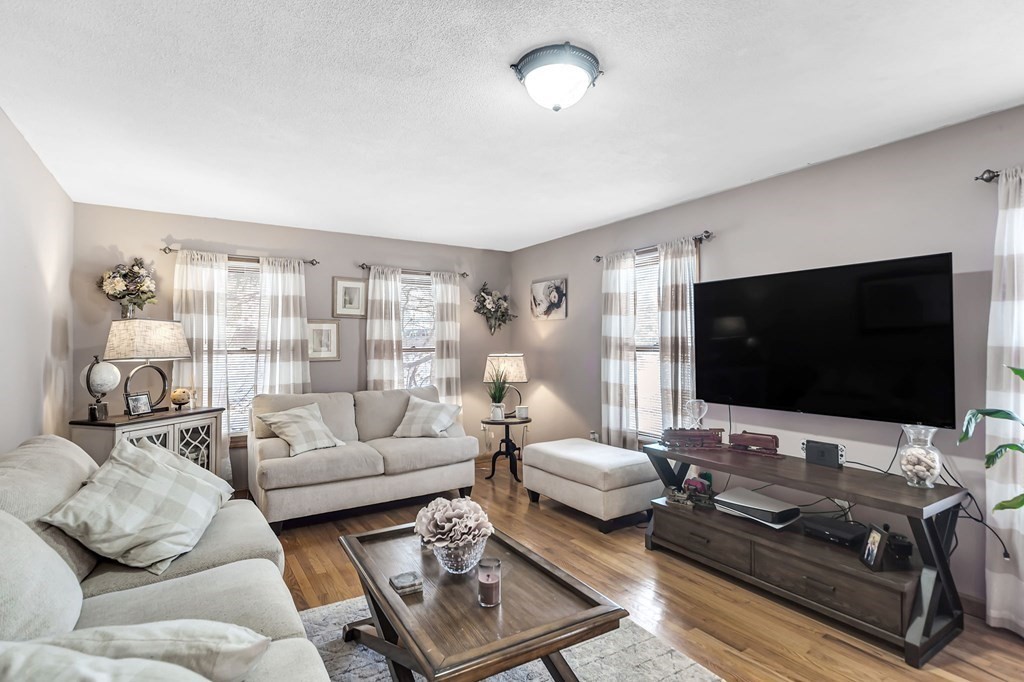 5 Pine Knoll Road Southwick, MA 01077 - Photo 5 of 40 a living room with furniture and a flat screen tv