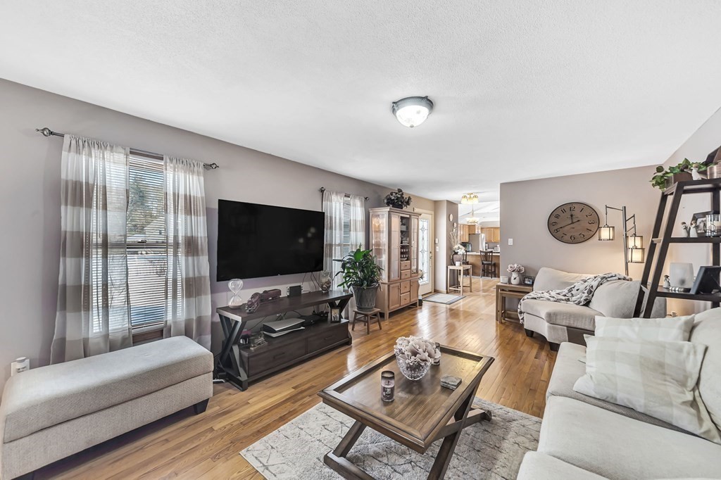 5 Pine Knoll Road Southwick, MA 01077 - Photo 7 of 40 a living room with furniture and a flat screen tv