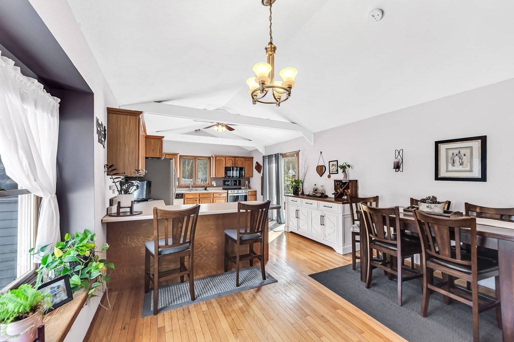 5 Pine Knoll Road Southwick, MA 01077 - Photo 10 of 40 a view of a dining room with furniture and wooden floor
