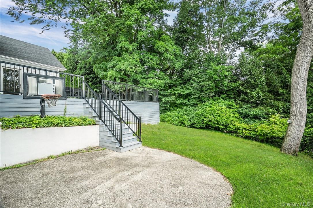4 Parkfield Road Scarsdale, NY 10583 - Photo 26 of 33 Backyard has both grassy area and large deck!
