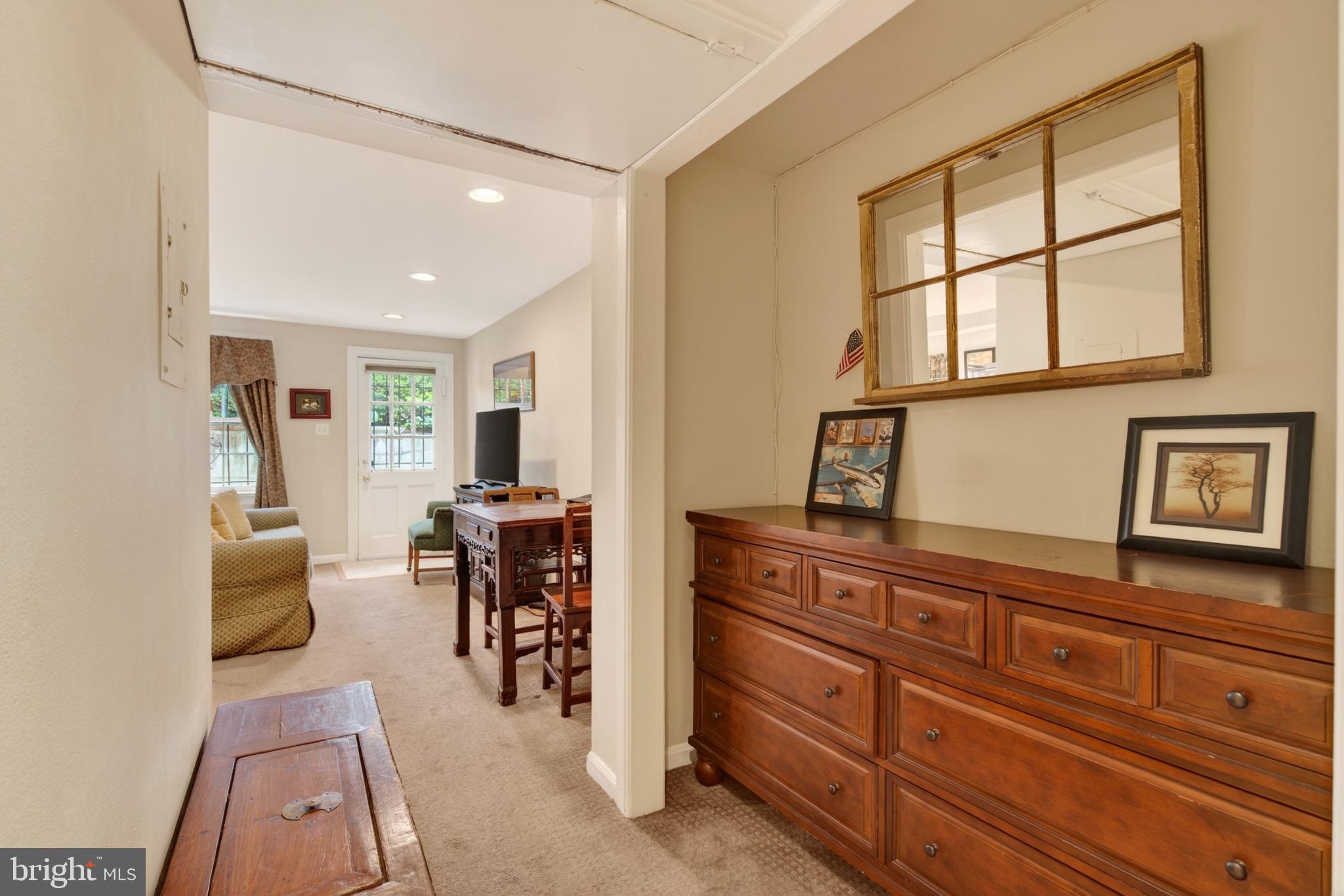 11 2nd Street Northeast, Unit 108 Washington, DC 20002 - Photo 11 of 18 Inviting hallway with warm accents.