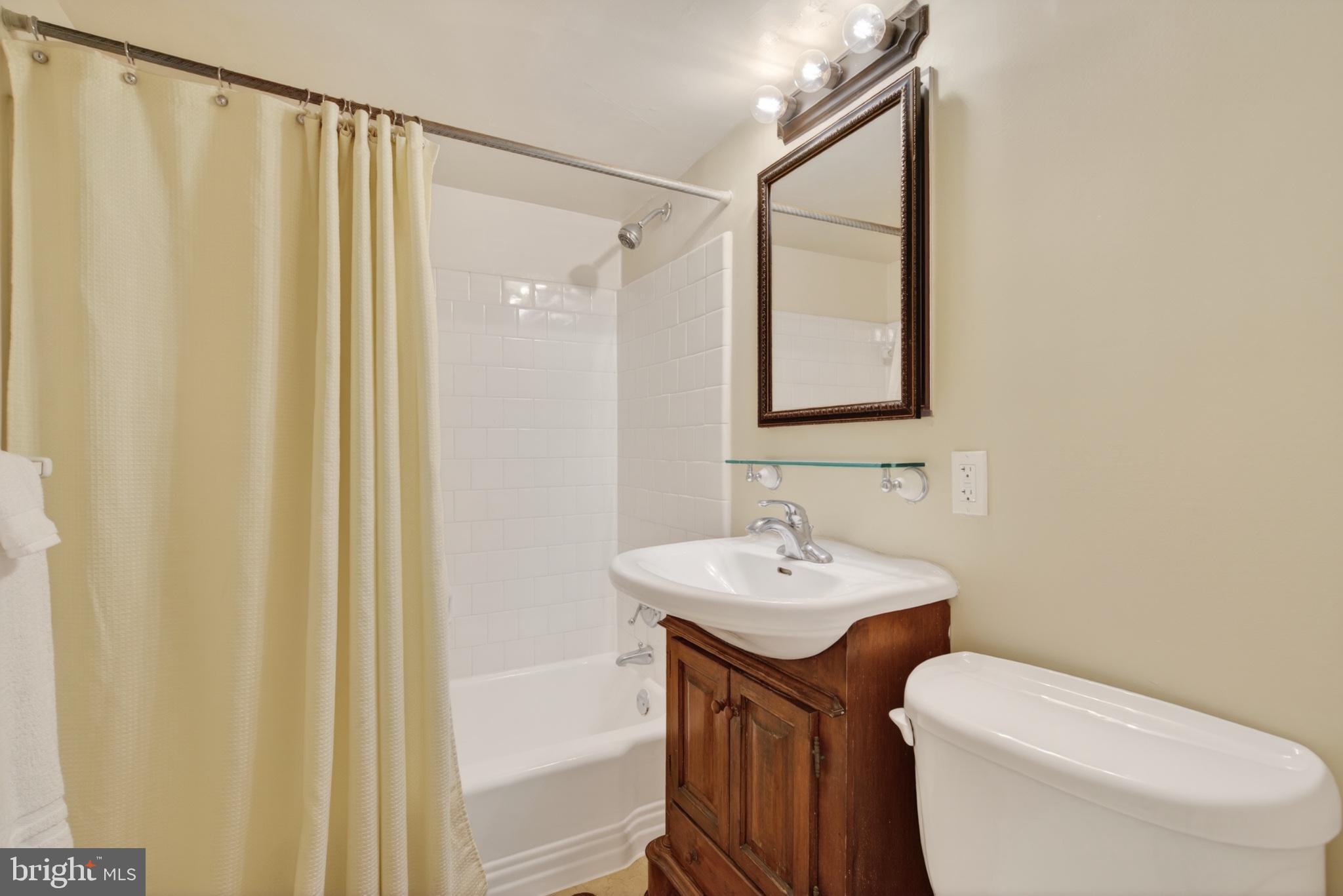 11 2nd Street Northeast, Unit 108 Washington, DC 20002 - Photo 14 of 18 Charming bathroom with modern touches.
