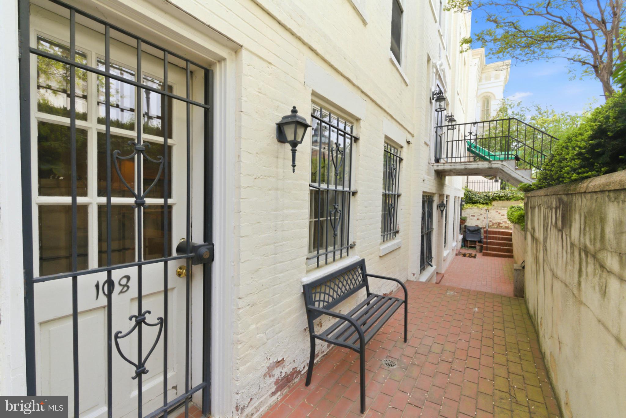 11 2nd Street Northeast, Unit 108 Washington, DC 20002 - Photo 15 of 18 Charming entrance with inviting path.