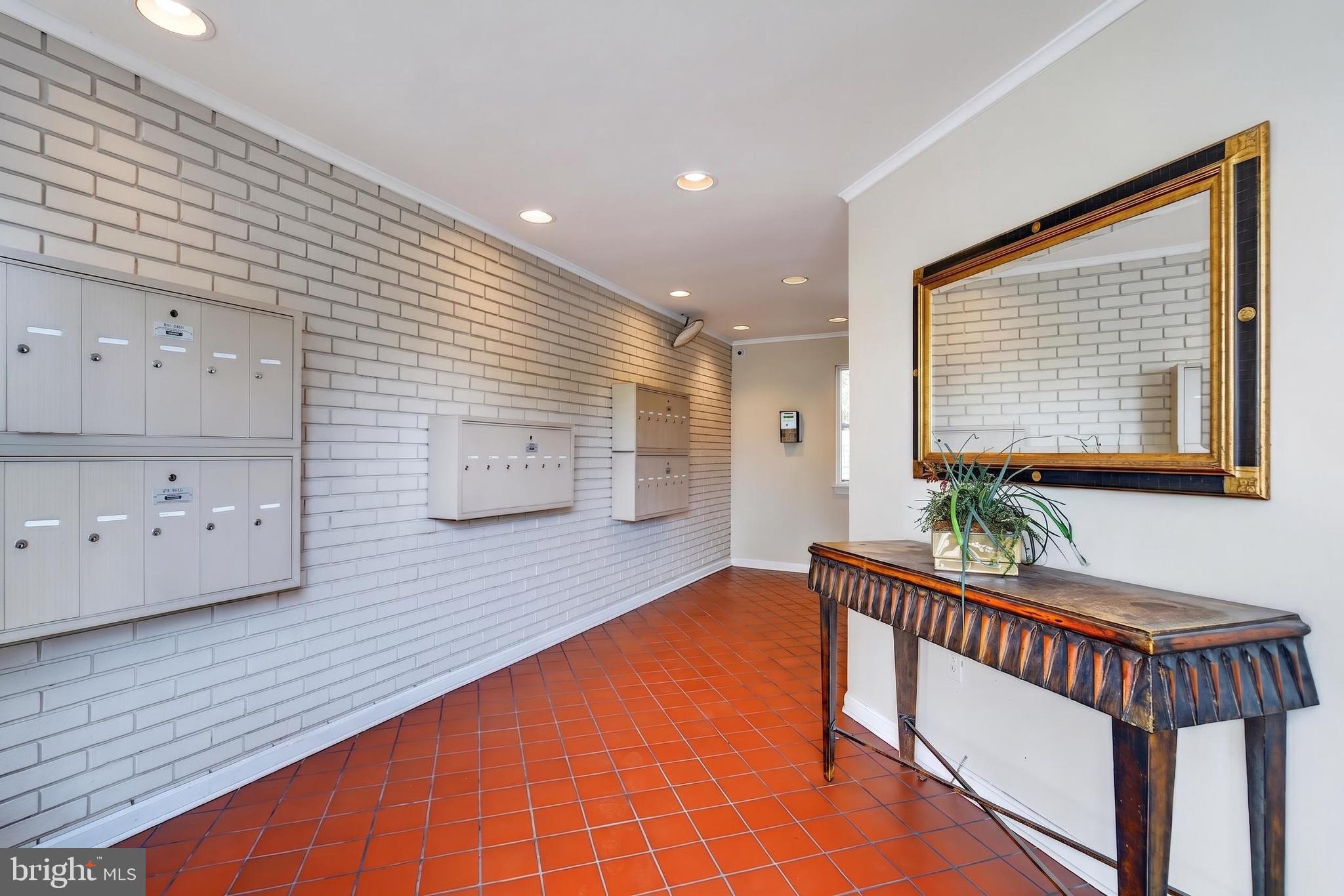 11 2nd Street Northeast, Unit 108 Washington, DC 20002 - Photo 16 of 18 Inviting entryway with modern charm.