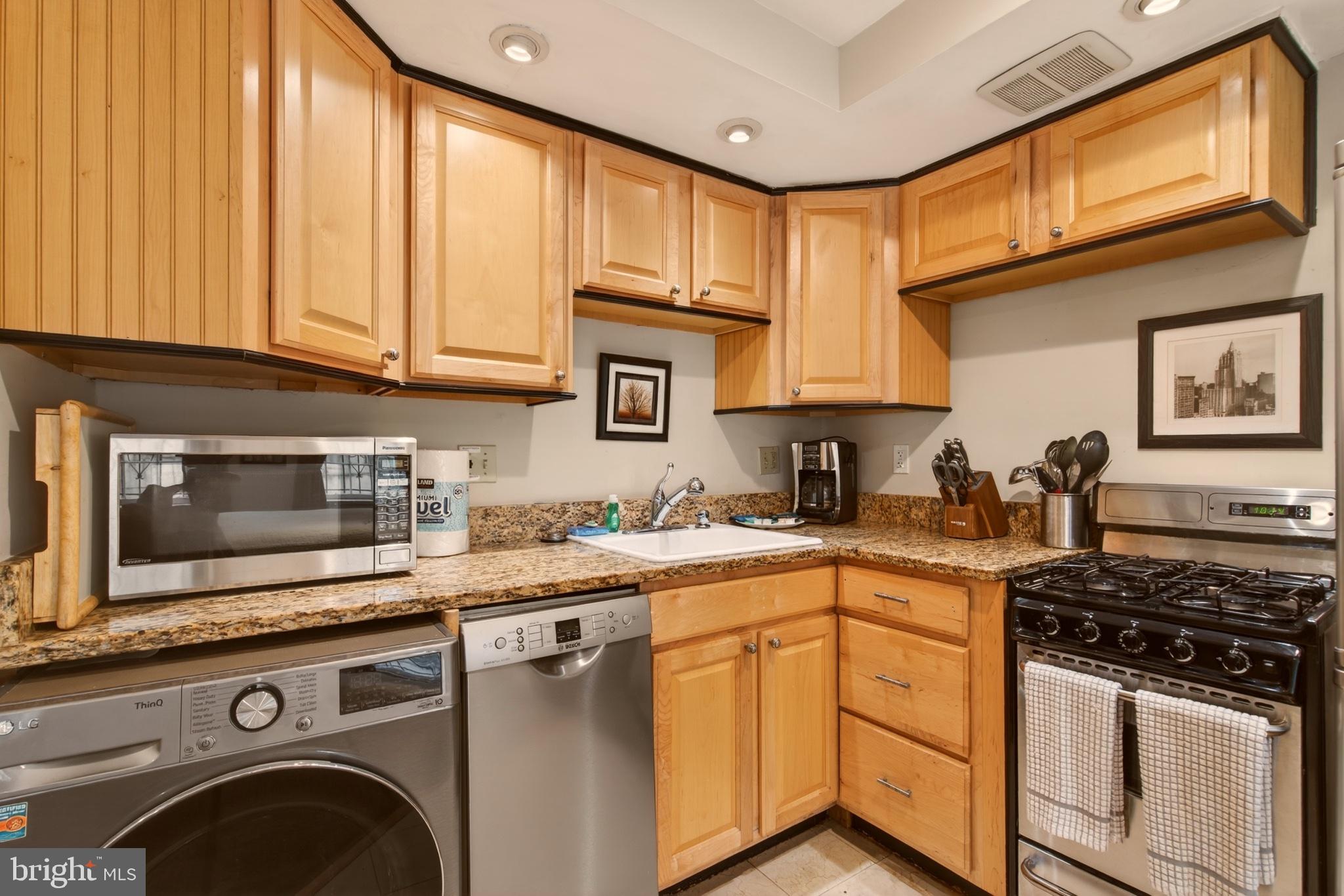 11 2nd Street Northeast, Unit 108 Washington, DC 20002 - Photo 9 of 18 Charming kitchen with modern finishes.