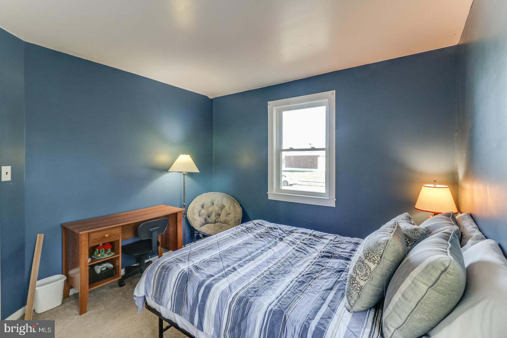306 South Brownleaf Road Newark, DE 19713 - Photo 14 of 30 a bedroom with a bed and window
