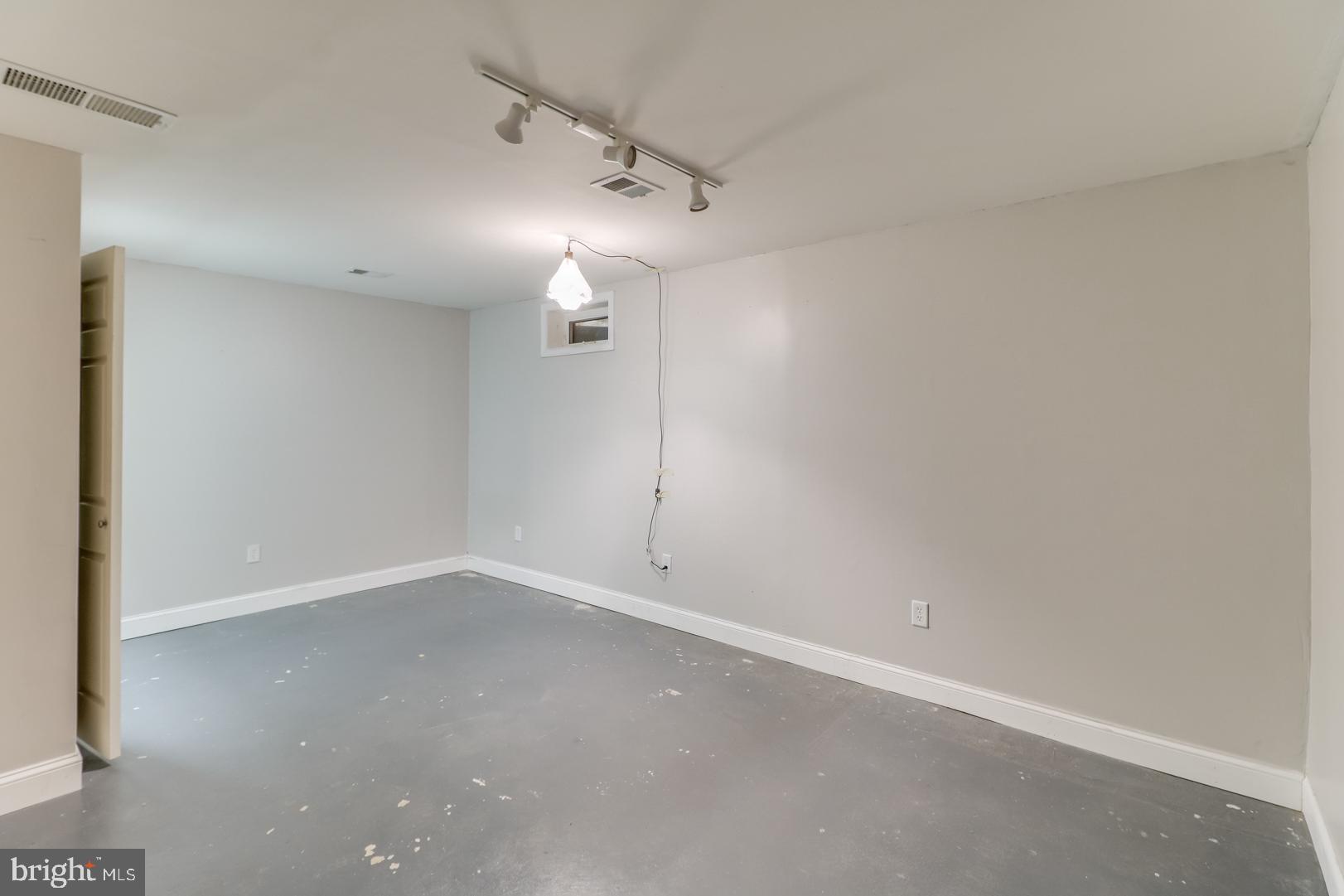 306 South Brownleaf Road Newark, DE 19713 - Photo 20 of 30 an empty room with staircase and white walls