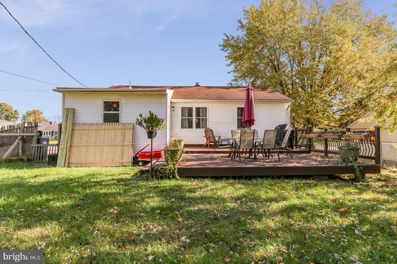 306 South Brownleaf Road Newark, DE 19713 - Photo 23 of 30 a view of a house with a backyard and a patio
