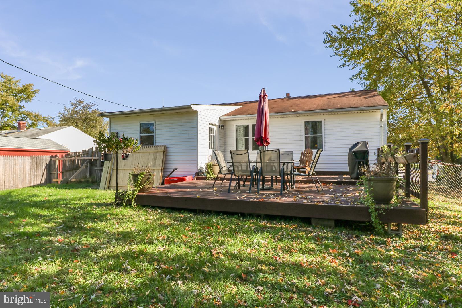 306 South Brownleaf Road Newark, DE 19713 - Photo 26 of 30 a view of house with backyard and outdoor seating