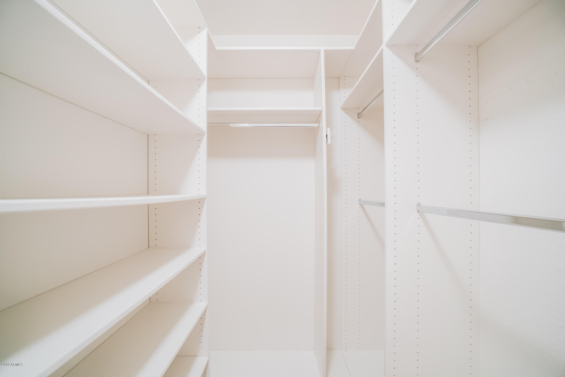 3707 West Carson Road Phoenix, AZ 85041 - Photo 11 of 17 a view of walk in closet