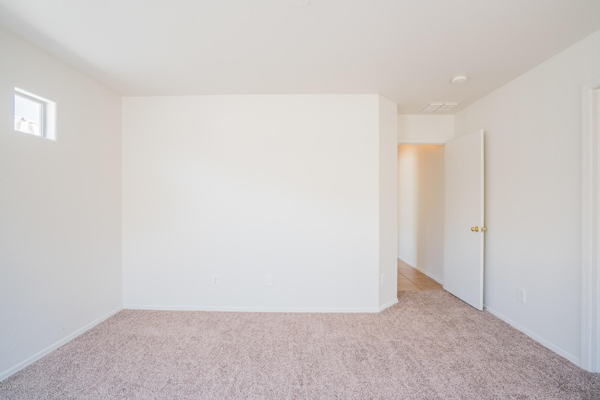3707 West Carson Road Phoenix, AZ 85041 - Photo 10 of 17 a view of an empty room