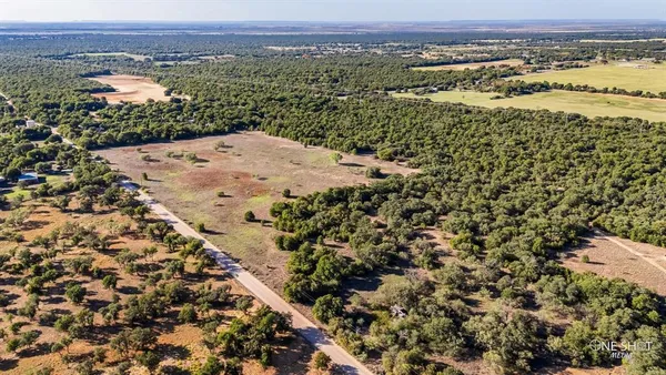 an aerial view of mountain with beach