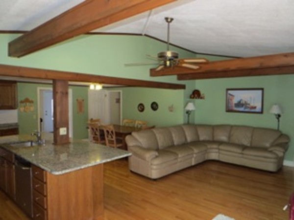 64 Oak Hollow Road Springfield, MA 01128 - Photo 4 of 22 a living room with furniture and wooden floor