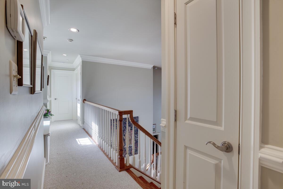 90 Swaggers Point Road Solomons, MD 20688 - Photo 32 of 54 Upper level landing is carpeted