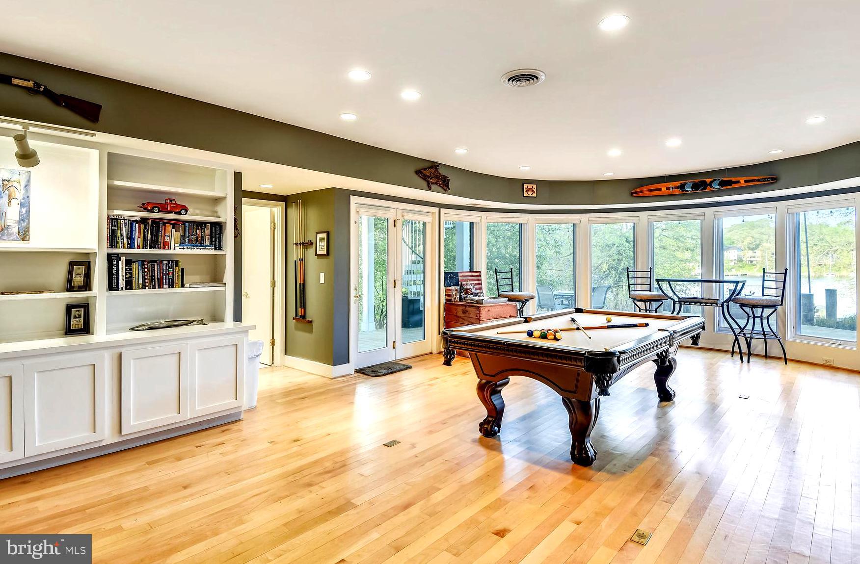 137 Inverness Road Severna Park, MD 21146 - Photo 11 of 46 a dining room with furniture and large windows