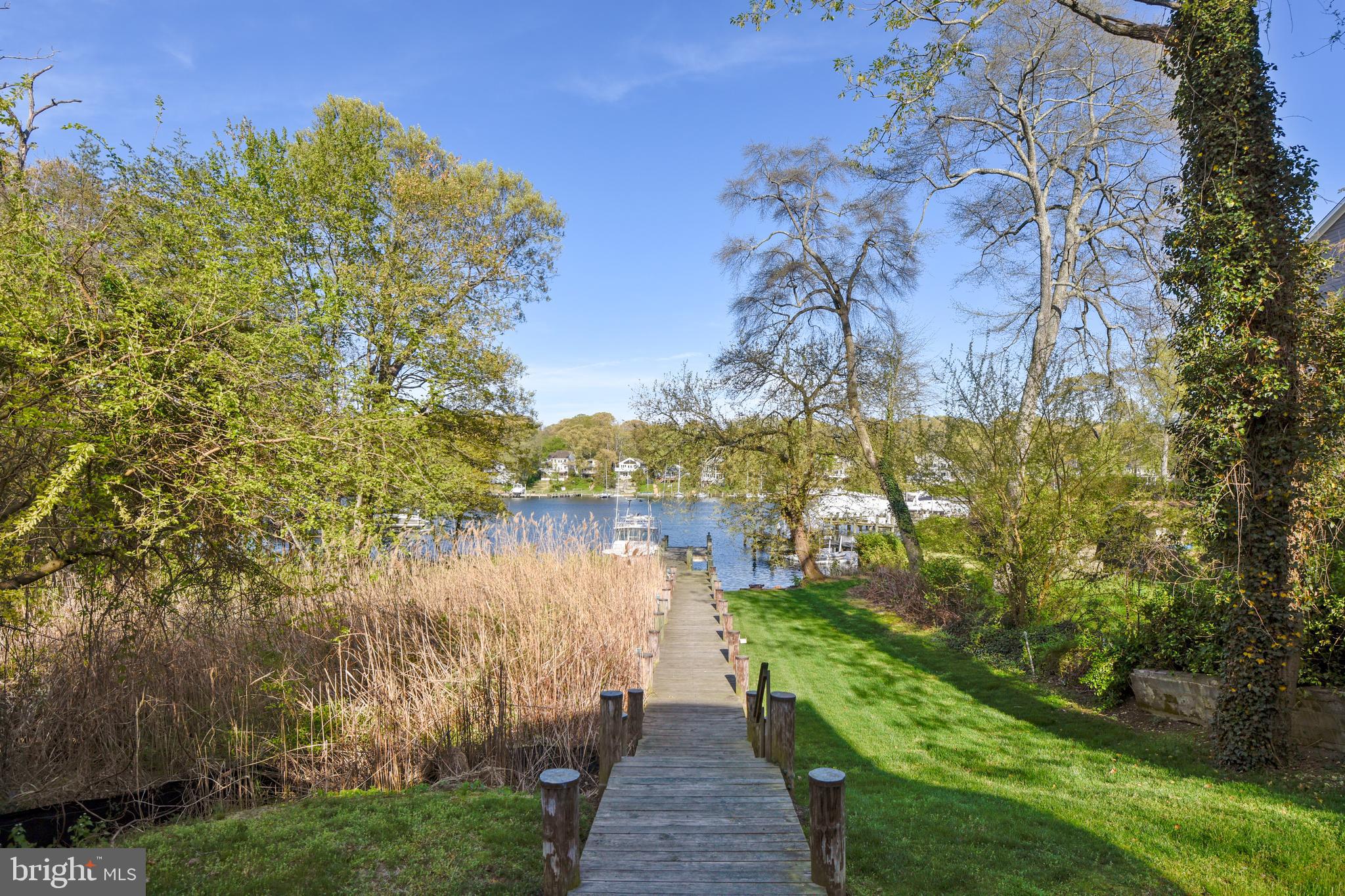 137 Inverness Road Severna Park, MD 21146 - Photo 12 of 46 a view of a lake with a yard