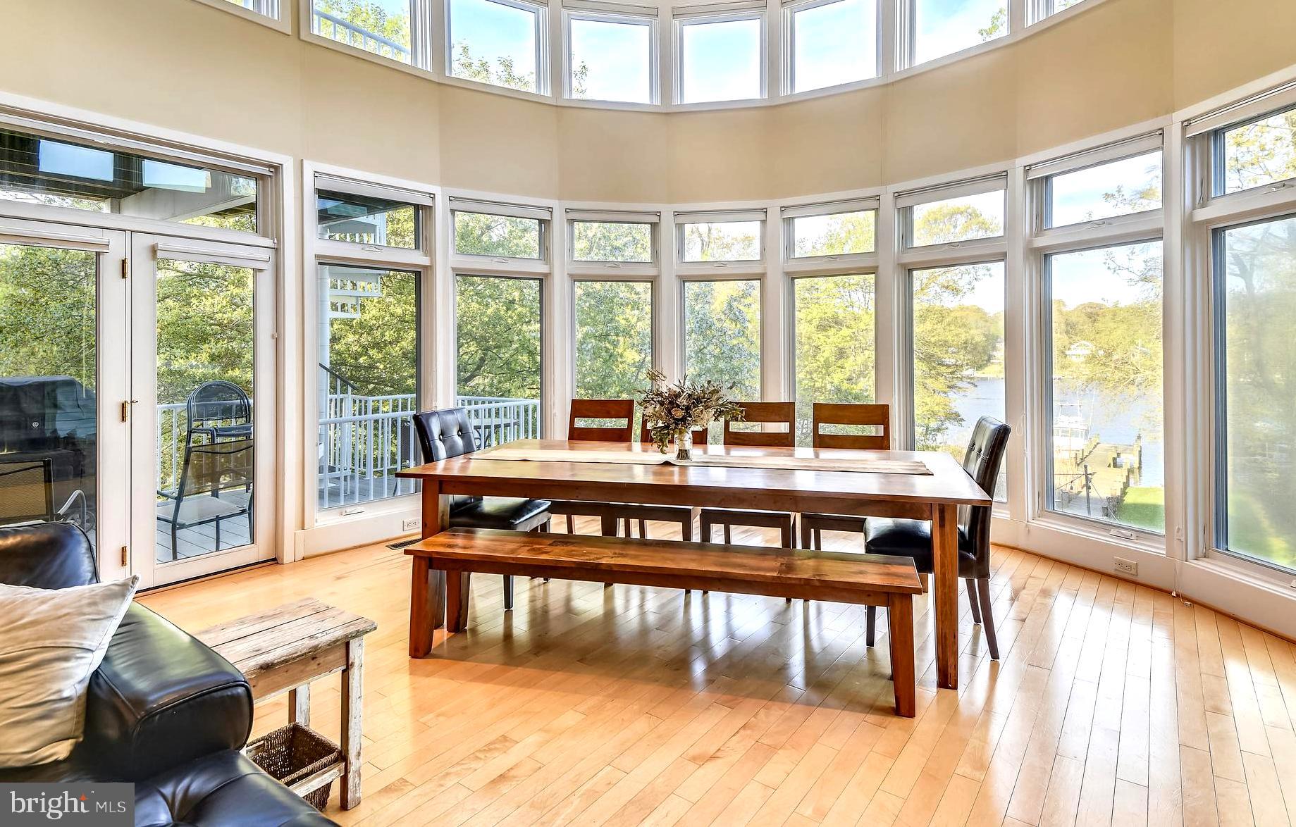 137 Inverness Road Severna Park, MD 21146 - Photo 22 of 46 a view of a dining room with furniture window and wooden floor