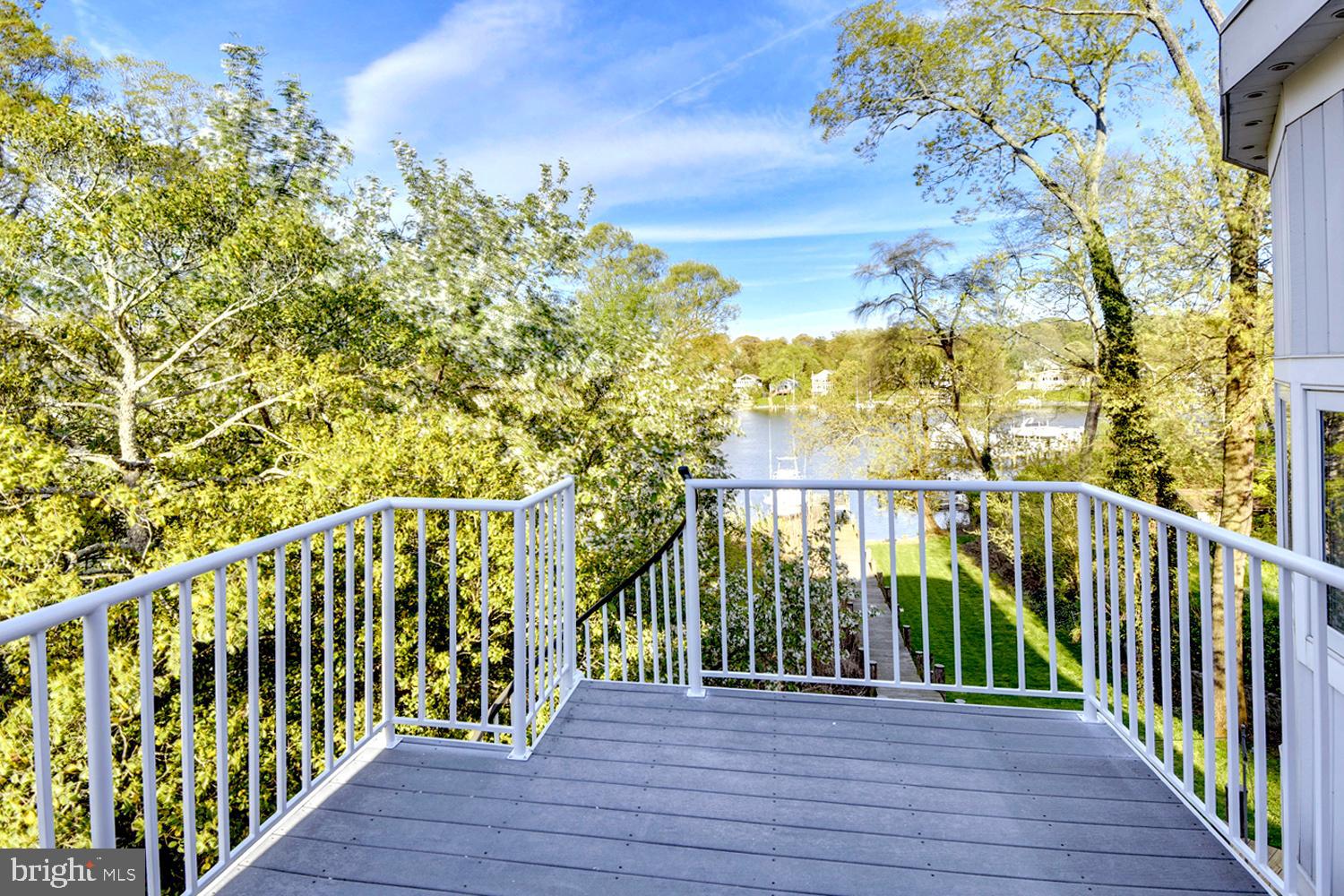 137 Inverness Road Severna Park, MD 21146 - Photo 31 of 46 a view of a balcony with wooden floor and fence