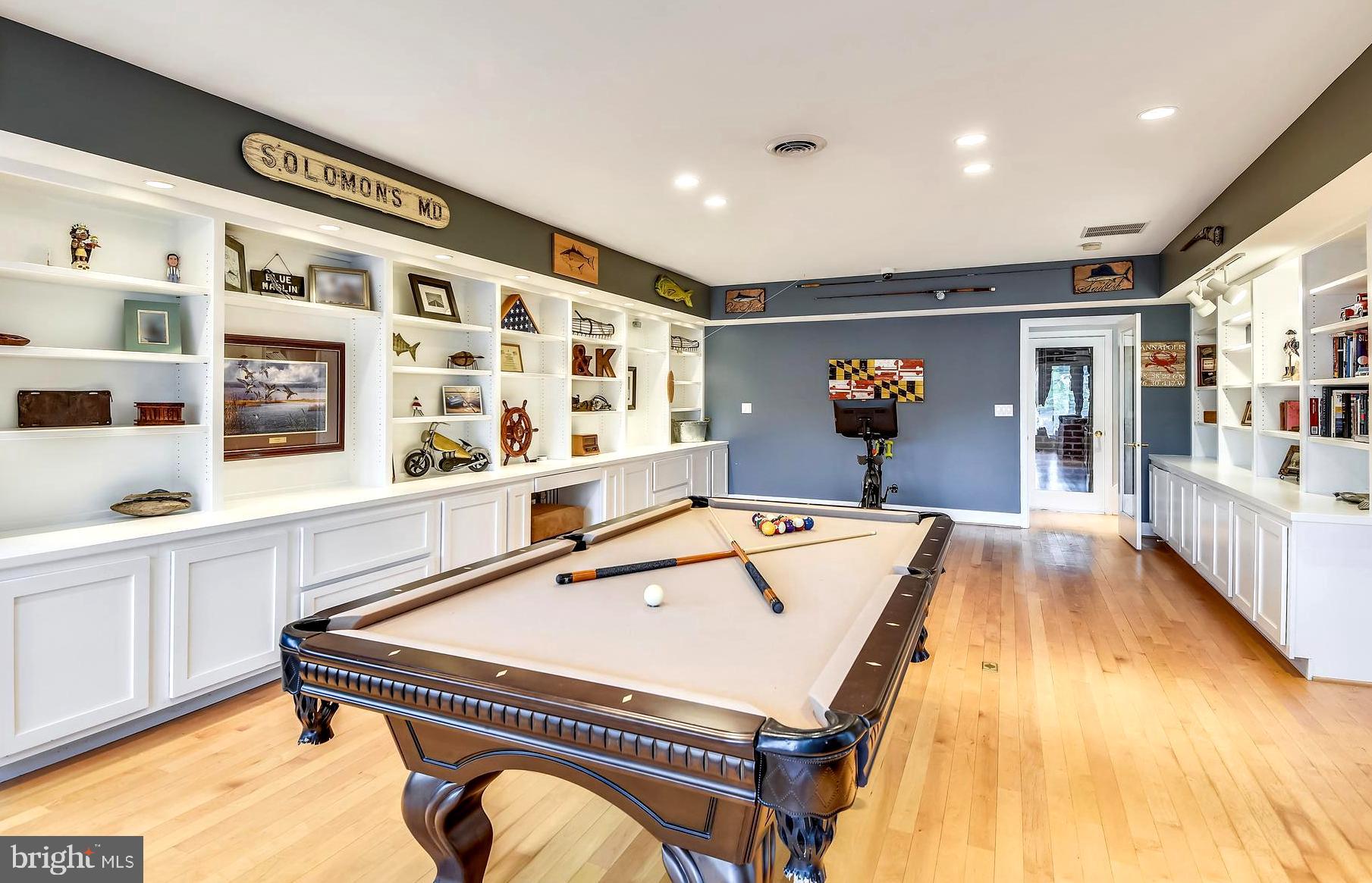 137 Inverness Road Severna Park, MD 21146 - Photo 41 of 46 a living room with pool table and a flat screen tv