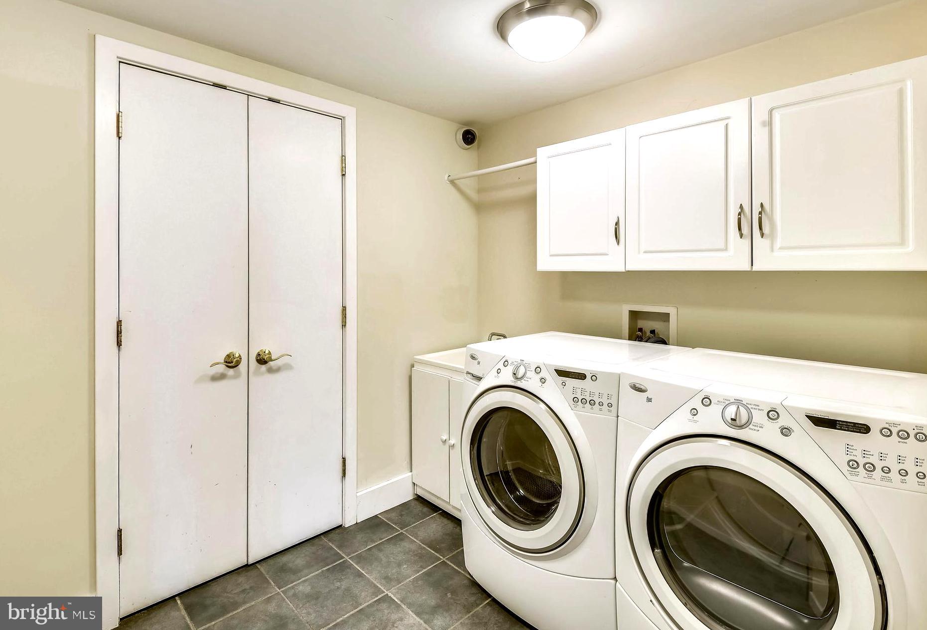 137 Inverness Road Severna Park, MD 21146 - Photo 45 of 46 a utility room with dryer and washer