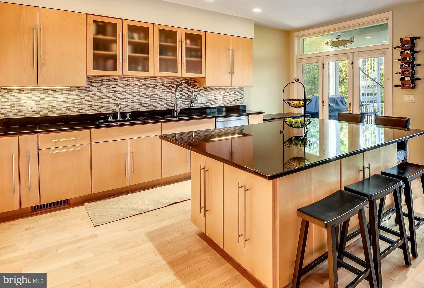 137 Inverness Road Severna Park, MD 21146 - Photo 9 of 46 a kitchen with stainless steel appliances granite countertop a sink and cabinets