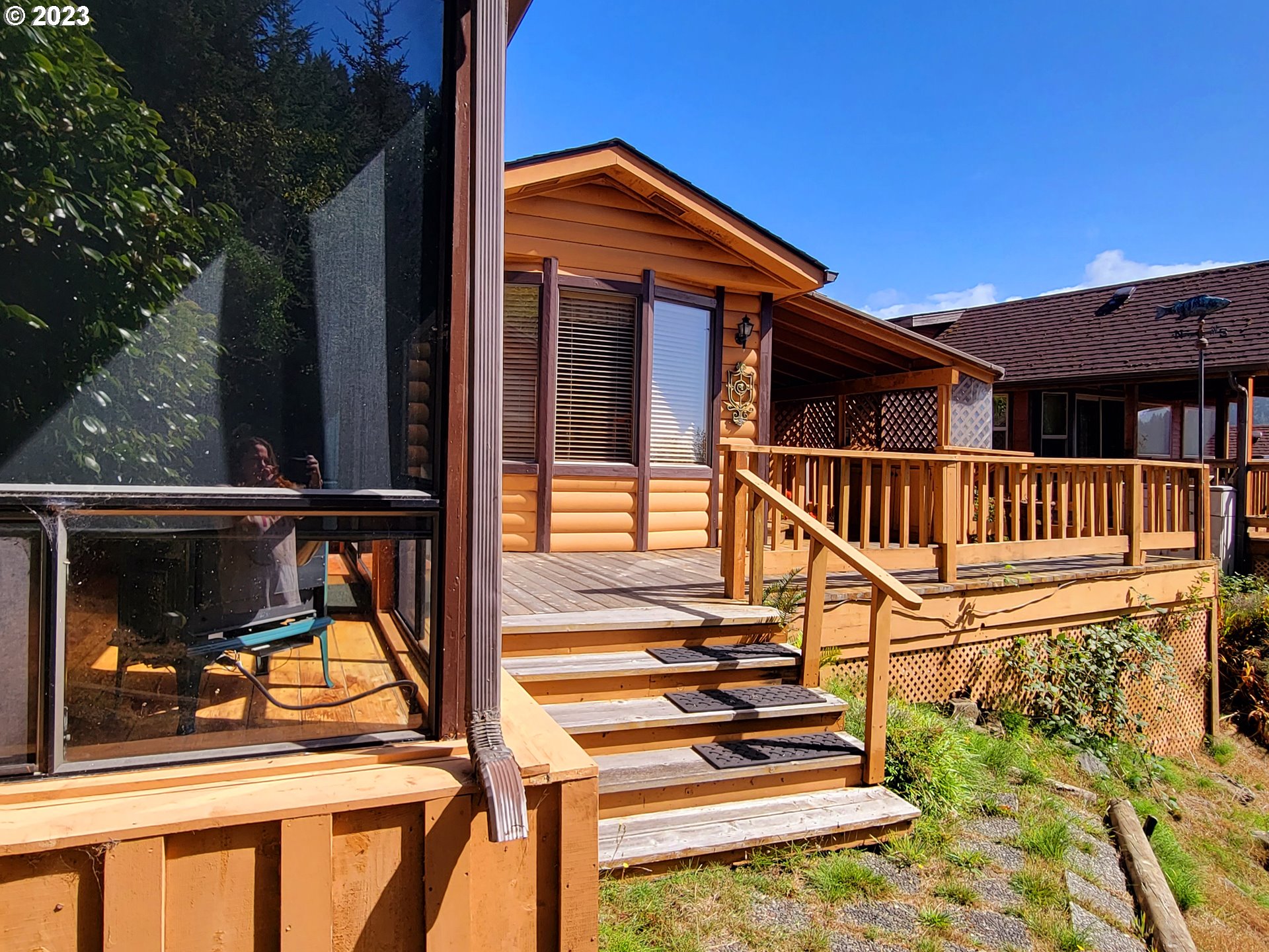 19921 Whaleshead Road, Unit OV8 Brookings, OR 97415 - Photo 18 of 48 front view of a house with a balcony