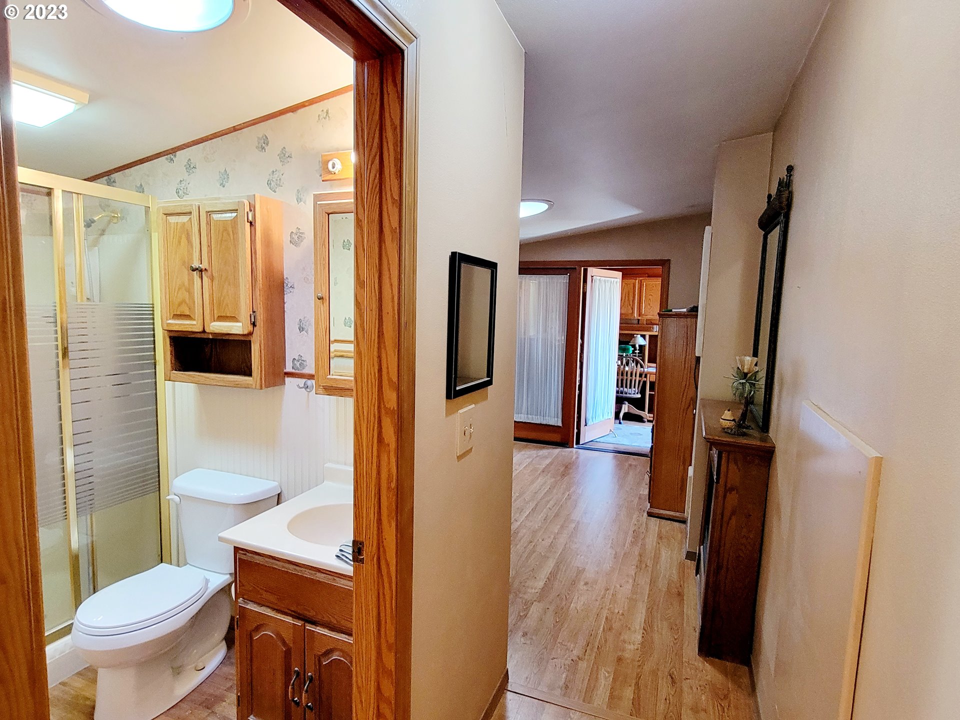 19921 Whaleshead Road, Unit OV8 Brookings, OR 97415 - Photo 36 of 48 a bathroom with a toilet and a shower