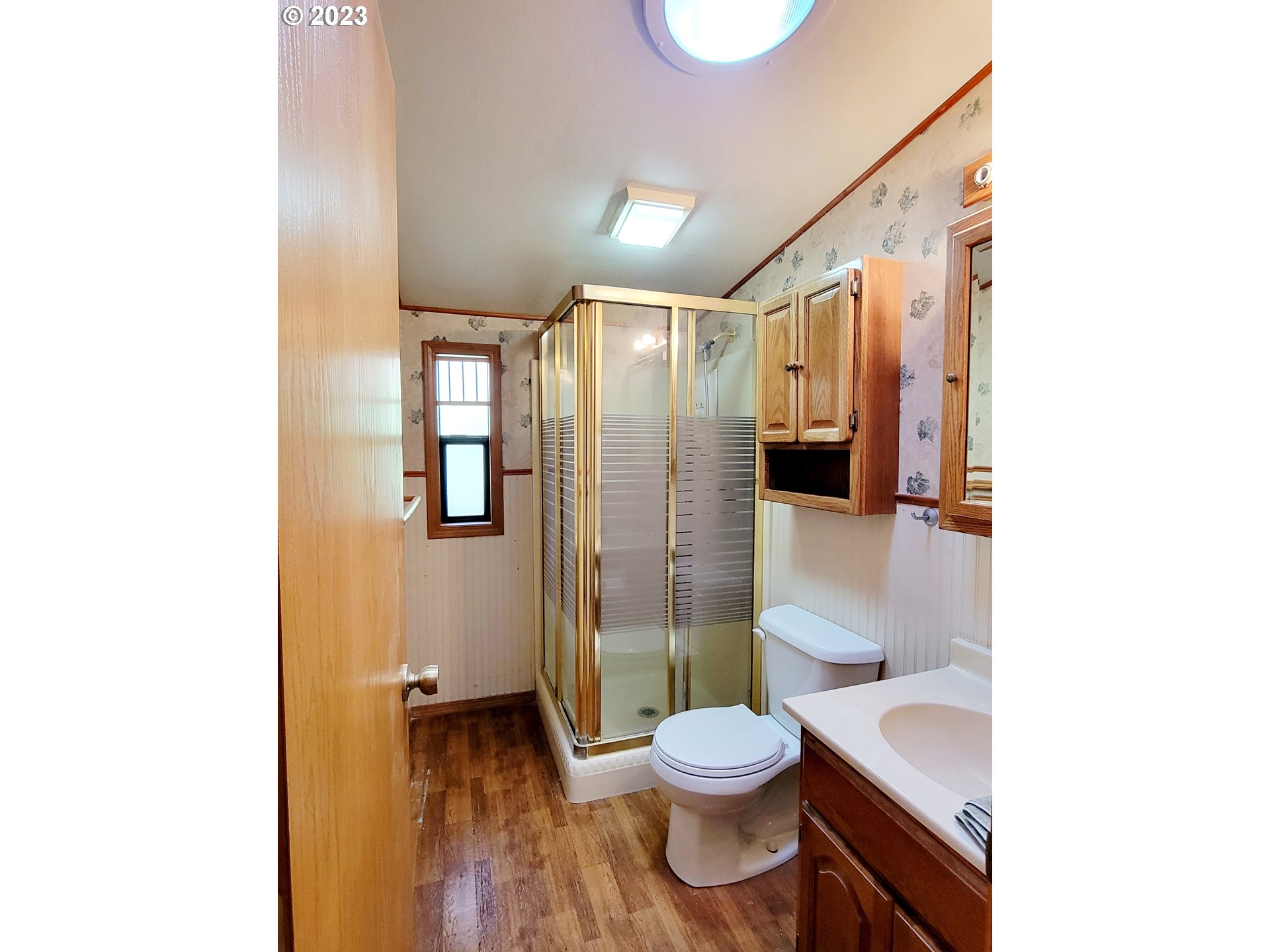 19921 Whaleshead Road, Unit OV8 Brookings, OR 97415 - Photo 37 of 48 a bathroom with a sink and a toilet