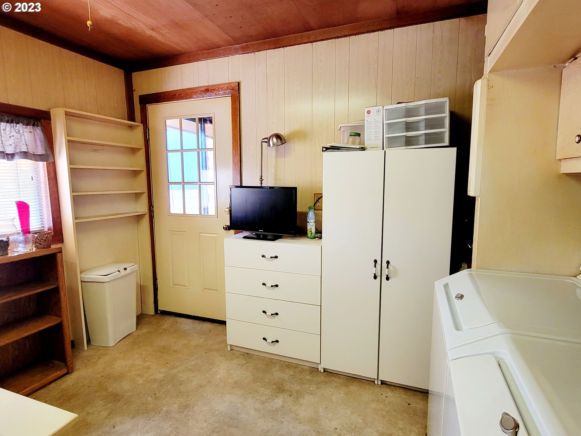 19921 Whaleshead Road, Unit OV8 Brookings, OR 97415 - Photo 45 of 48 a view of walk in closet with clothes and shoes