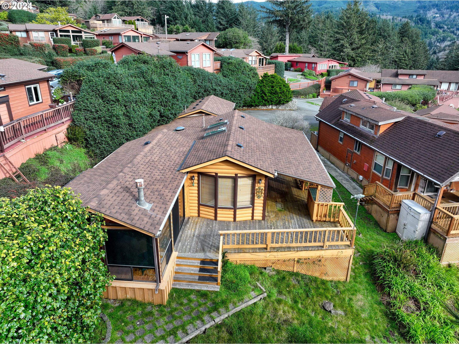 19921 Whaleshead Road, Unit OV8 Brookings, OR 97415 - Photo 48 of 48 aerial view of a house with a yard