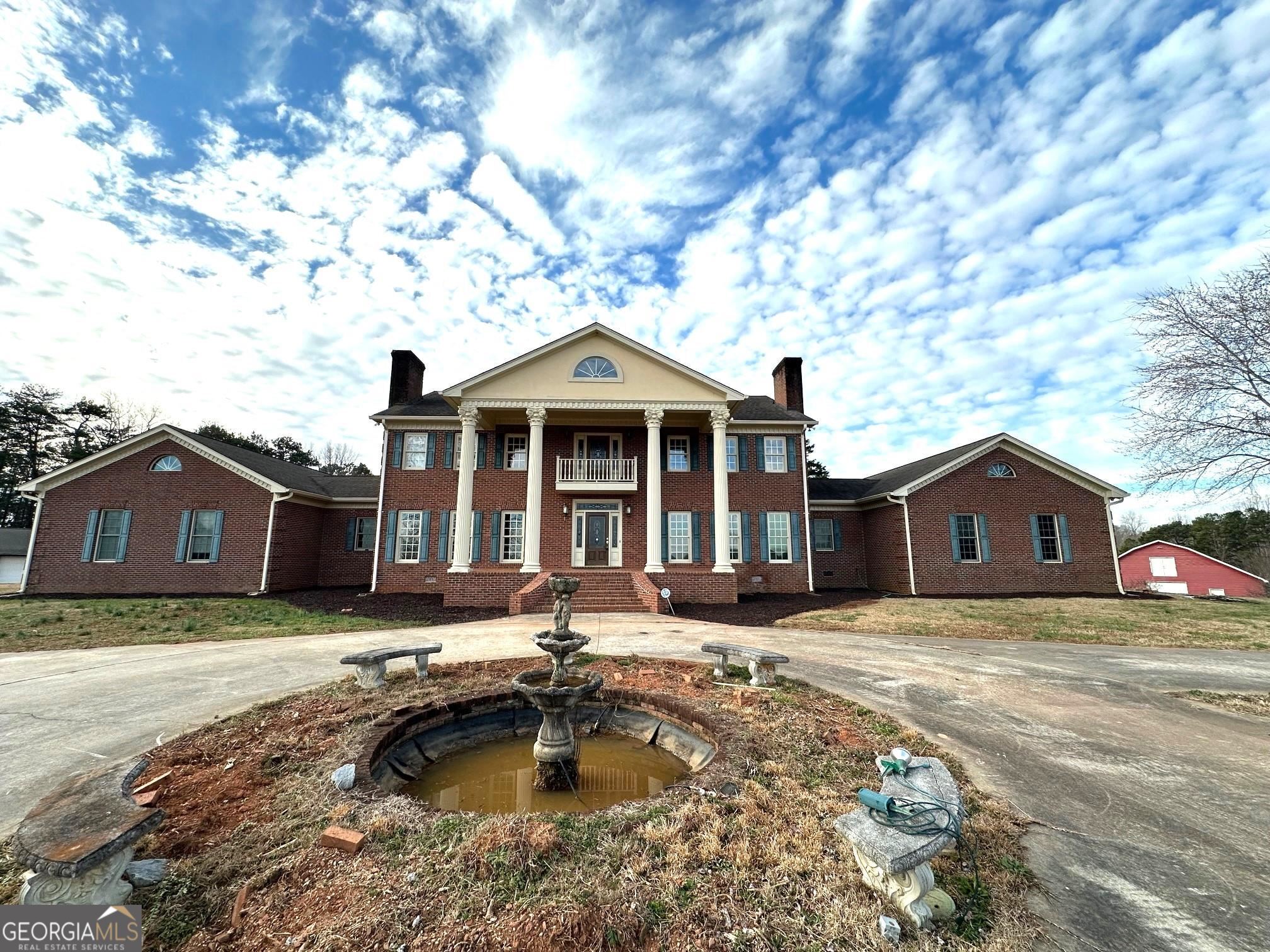 320 Walker Road Toccoa, GA 30577 - Photo 1 of 1 a front view of a house with swimming pool
