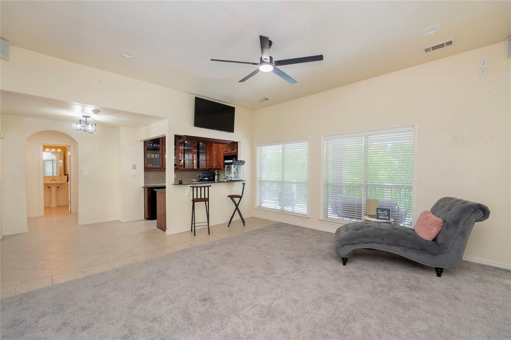 135 Kirkpatrick Road Ennis, TX 75119 - Photo 21 of 40 a living room with furniture and a large window
